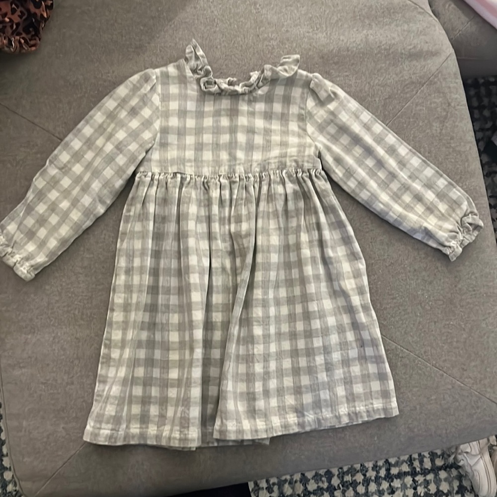 Gray and white plaid dress with ruffle collar and sleeve